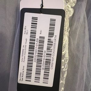 Cocomelody A-Line Court Train Tulle Wedding Dress LD5845 in Ivory/Silver.